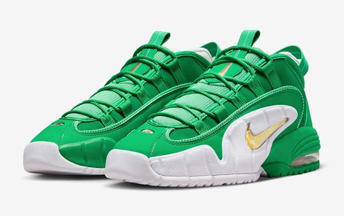 Penny Hardaway's green and white Nike sneakers.